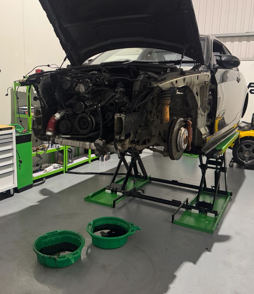 Front-end strip down during engine, cooling and suspension restoration.