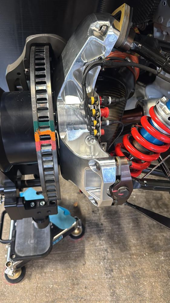 Race suspension and brake assembly detail.