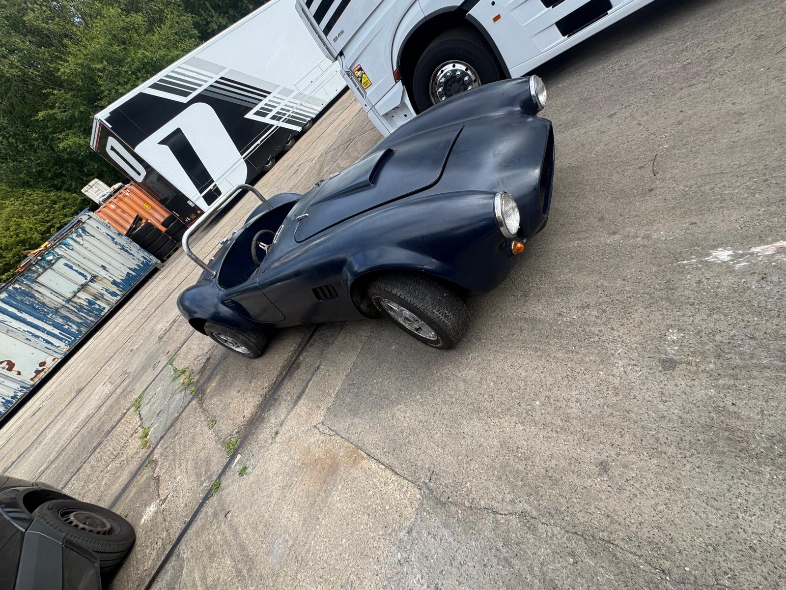 Front three-quarter view showing the car in as-found condition.